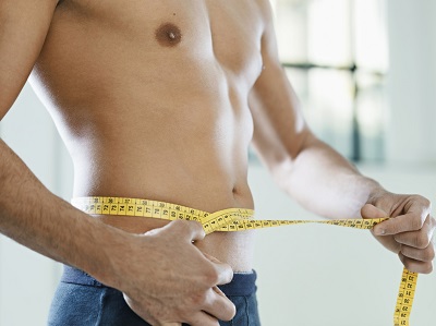 Costa Mesa man measuring weight loss IV effects